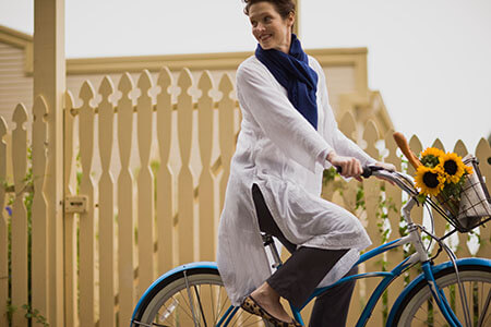 Happy Woman Enjoying a Bike Ride