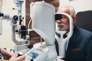 older man getting eye exam