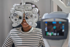 Girl receiving eye exam